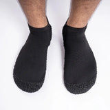 Top view of DIRTS barefoot socks on feet
